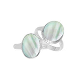 Sterling silver oval Mother of Pearl ring with polished bezel setting, handcrafted artisan statement jewelry with luminous iridescent shell.